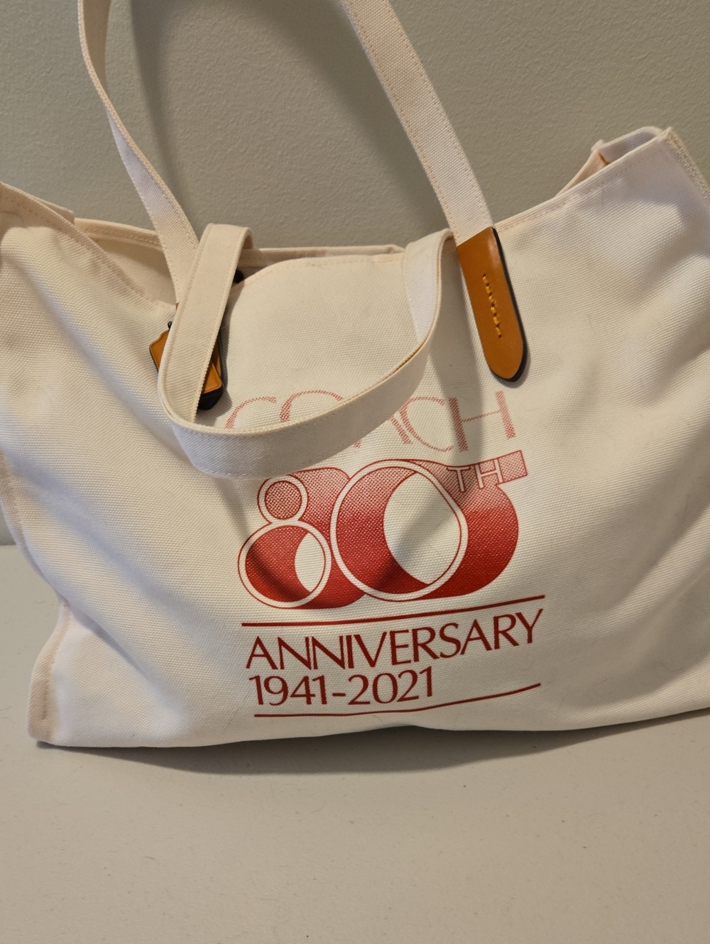 Coach Cream Canvas Tote with Red Anniversary Graphic
